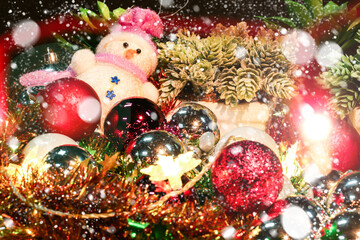 Obraz na płótnie Canvas Christmas balls and snowmen with bright stars for joy and fun weave warmly in the New Year.