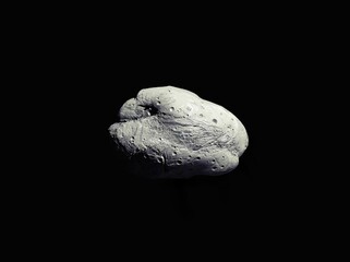Naklejka premium Asteroid with craters in space with stars. Surface of the asteroid.