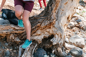 Young Tourist Girl and Summer Sandy Hills Landscape. Travel Mountain location of Popular Attraction. View of beautiful nature Desert