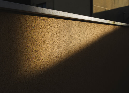 Detailed view of textured wall in sunlight