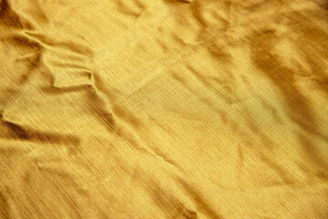 golden satin fabric textile, background for christmas design