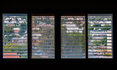 window shutter view to the urban city