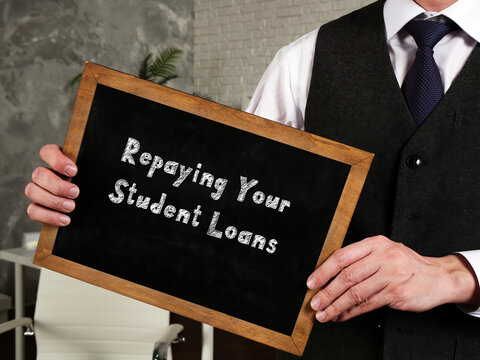 Repaying Your Student Loans Sign On The Sheet.