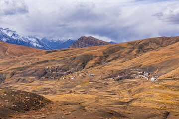 Bird eye aerial view of Hikkim village, famous for highest Post office of the world located in the cold desert valley of Spiti at elevation of 4400m in the Himalayas of Himachal Pradesh, India.