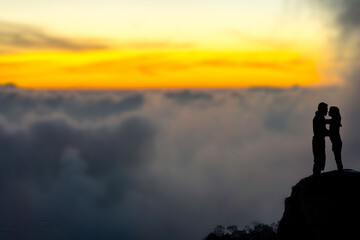 Couple and Mist on the Mountain