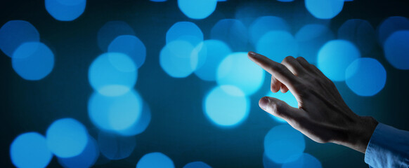 business man presses on touch screen
