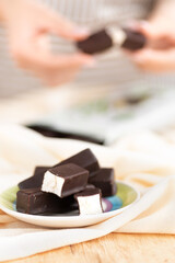 Homemade souffle candy in chocolate. Chocolate candy bird's milk