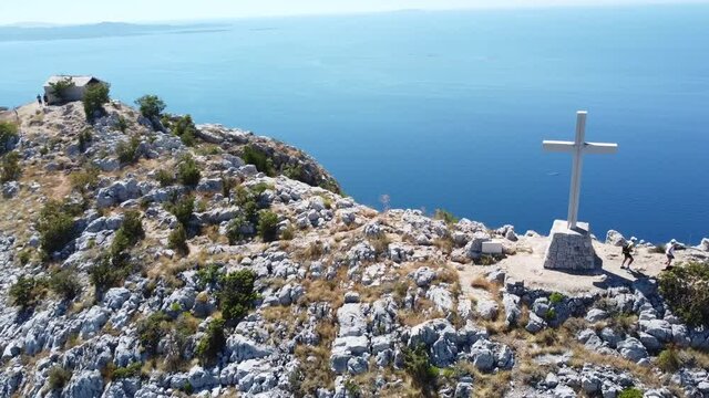 fly around cross at the highest point of Hvar island in Croatia - sv.Nikola