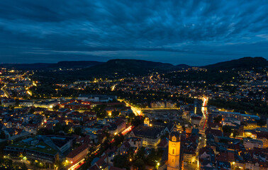 Fototapeta na wymiar Cityscape over jena in the night from a tower at downtown
