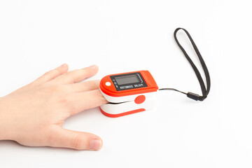 Pulse Oximeter, finger digital device to measure oxygen saturation in blood. Coronavirus symptoms concept.