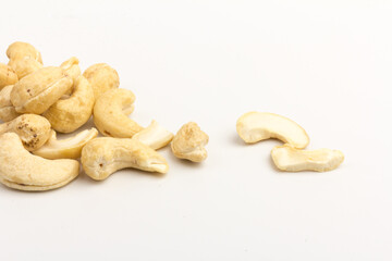 Raw cashew nuts isolated on white background.