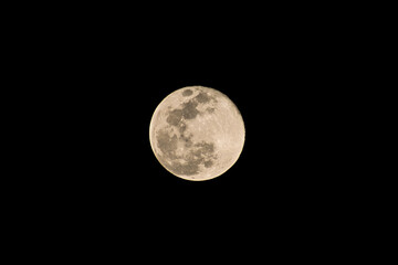 A supermoon is a full moon that nearly coincides with perigee, the closest that the Moon comes to the Earth in its elliptic orbit resulting in a slightly larger-than-usual apparent size of lunar disk.