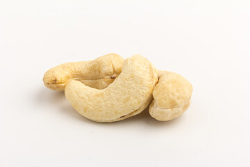 Raw cashew nuts isolated on white background.