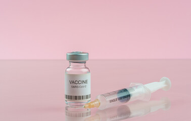 Coronavirus vaccine vial and medical syringe