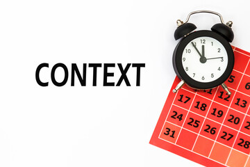 CONTEXT, Abstract calendar and Watch. Business concept written on notepad with space.
