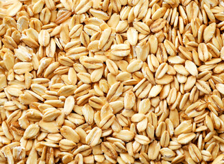 Raw oatmeal close-up, background. The view from top