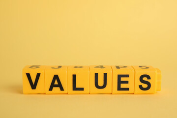 Blocks with word VALUES on yellow background