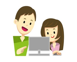 パソコンを見る男の人と女の人