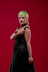 Fototapeta premium Woman dressed in gothic clothes, scary halloween