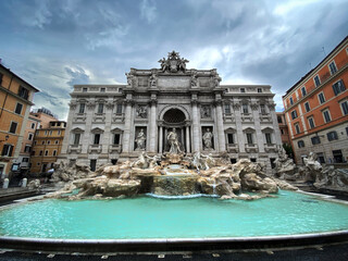 Trevi fountain in cloudy autumn day