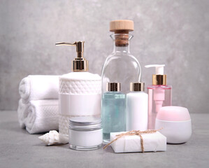 Fototapeta na wymiar Cosmetic bottles set,body care items,collection of beauty containers.Skin care.