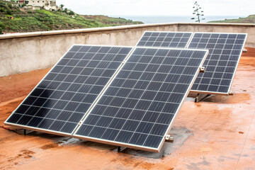 Solar photovoltaic panels 
on the roof of a house