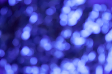 Naklejka premium Abstract festive bright colorful background of blurred unfocused lights