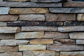 Decorative brick wall with brown seamless texture