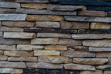 Decorative brick wall with brown seamless texture