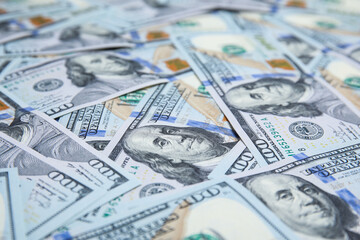 Many dollar banknotes as background, closeup view