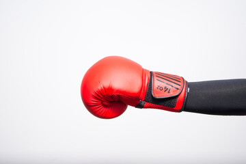 Red boxing gloves on. Boxing fight, fight concept.