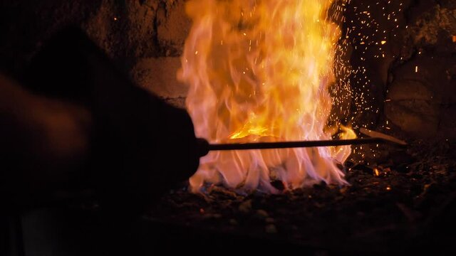 Charcoal Fire Is Burning With sparkles In Slow Motion