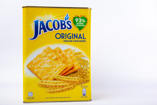 Kuala Lumpur, Malaysia-April 15, 2020: A metal cane of Jacob's Original Cream Crackers over white background. The great tasting biscuit specially formulated for entire family.