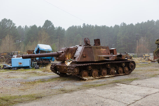 abandoned self-propelled artillery unit ISU-152 on the territory of the former vehicle fleet of the abandoned city of pripyat