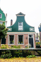 Fototapeta premium Traditional Dutch house in Zaanse Schans. Small village in Amsterdam, Netherlands.