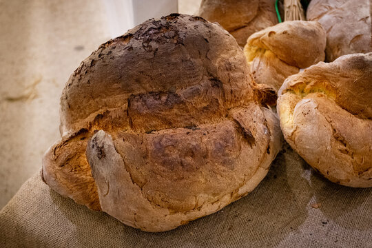 The delicious Altamura bread called u sckuan&egrave;te made of durum wheat flour. Traditional food of Puglia, Italy