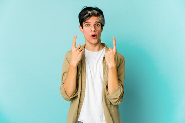 Young caucasian skinny man expressing emotions isolated on blue background