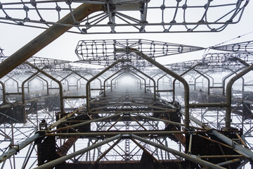 Soviet radar Duga in foggy weather. Russian woodpecker - over-the-horizon radar station near Chernobyl