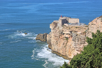 Fototapeta na wymiar Cliffs above Nazare beach, Portugal 