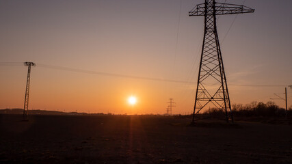 Beautiful orange sunset on the edge of the city