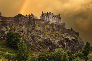 Fototapeta na wymiar View of Edinburgh Castle from the New Town, with a stormy sky, UK