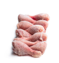 Frozen raw chicken legs isolated on white background