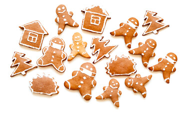 Pattern of gingerbread cookies on a white background. Christmas mood or food design. Creative copy space.