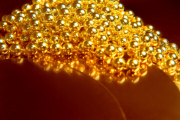 blurry golden glitter christmas abstract background. Concept of beauty and jewelry texture