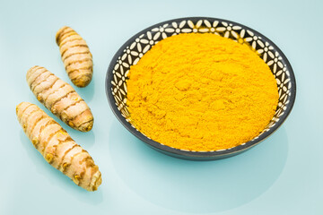 Turmeric. A healthy spice of yellow color, used in many cuisines of the world. Plant in the form of a root and powder