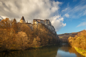 Fototapeta premium The medieval Orava Castle above a river at autumn, Slovakia, Europe.