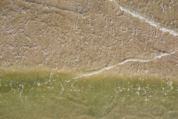 sandy beach on the seashore, view from above