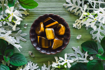 Tiger's Eye and Clear Quartz Points with Jasmine Flowers and Foliage