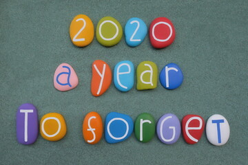 2020, a year to forget, creative logo composed with multi colored stone numbers and letters