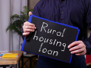 Rural housing loan is shown on the business photo using the text